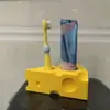 Soporte para cepillos de dientes/portalápices con lazo transfronterizo Soporte para cepillos de dientes/portalápices con lazo