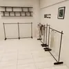 Estante de exhibición para tienda de ropa perchero negro para tiendas de ropa de mujer y niño estante de pie estante de arte de hierro isla de exhibición perchero para vestidos
