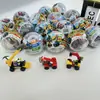 Série Cuidadosamente Selecionada de Cápsulas Laminadas de 75mm com Blocos de Construção de Desenho Animado, Incluindo Aviões, Carros, Tanques e Brinquedos Surpresa para Crianças