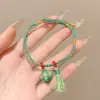 Pulseira de corda colorida zongzi do Festival do Barco-Dragão 2026 novo modelo pulseira trançada artesanal étnica infantil atacado corda vermelha