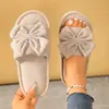 Pantuflas de niña de alto valor con lazo, pantuflas de casa para las cuatro estaciones, chanclas de suela plana para interior y exterior