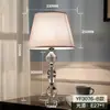 Lámpara de mesa de cristal, una lujosa luminaria de estilo europeo, adecuada para una sala de estar posmoderna, como lámpara de pared de fondo o como lámpara de noche en el dormitorio; diseño simple y moderno