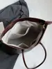Bolso tote de gran capacidad estilo coreano, nuevo modelo principios de otoño 2026, bolso de hombro casual simple para el trabajo y los desplazamientos