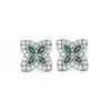Pendientes de trébol de cuatro hojas europeos y americanos con incrustaciones completas de circonita, pendientes simples y elegantes con un toque de alta gama, accesorios para orejas de moda personalizados, disponibles para venta al por mayor