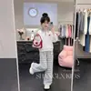Conjunto de dos piezas de moda coreana estilo universitario, personalidad moderna, cuello polo, sudadera, pantalones casuales de pierna ancha a cuadros para niñas en primavera y otoño