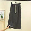 Falda midi de rayas blancas y negras, estilo vintage, cintura elástica con cordón, falda de línea A, adelgazante, falda ajustada con abertura