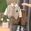 Conjunto de Ropa de Invierno para Niños Conjunto Elegante de Otoño/Invierno Estilo Academia Chaleco Suéter Conjunto de Tres Piezas Bebé Con Felpa Adicional Nuevo Estilo 2026