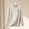Camiseta térmica de capa base para hombre de otoño e invierno, camiseta de manga larga con cuello semi-alto, top de marca de moda, ropa de alta calidad para hombre