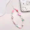 Lindo y fresco cordón para teléfono con cuentas de fresa, adecuado para todas las fundas de teléfono, correa de muñeca anticaída