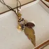 Nuevo Collar de Pluma de Bronce Zen Chino para Mujer Estilo Étnico Bohemio Doble Capa Cadena Larga para Suéter Accesorios