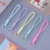 Nuevo cordón tejido de colores con encaje anudado, correa de muñeca anti-pérdida para teléfonos móviles, accesorio de llavero de muñeca hecho a mano