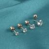 Pendientes de acero inoxidable de 0,8 mm con borde cruzado, chapados en oro, con circonita blanca, rosca externa, diseño cilíndrico y bola de diamante.