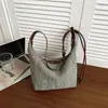 Bolso tejido a mano para mujer 2026 otoño nuevo moderno de moda retro tote bag versátil gran capacidad bolso de hombro único para mujer