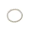 Pulseira Clássica de Pérolas para Mulheres, Semelhante ao Estilo da Shijia, com um Toque de Luxo Leve e Sofisticado, Apresentando Cordão Elástico e Delicadas Miçangas de Arroz para Empilhamento