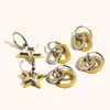 Pendientes de Diseño Elegante de Nicho Transfronterizos Europeos y Americanos Acero Inoxidable Chapado en Oro de 18 Quilates Pendientes de Estrella de Cinco Puntas para Mujer Gama Alta