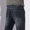 Outono de 2026 Novos Jeans Masculinos Retos Slim Fit Jovens Elásticos Largos Moda Tendência Calças Masculinas Tendência