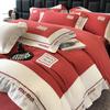Ropa de cama simple de color sólido engrosada de lujo ligero algodón lijado juego de cuatro piezas sábana funda nórdica otoño e invierno