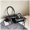 Bolso de Salchicha Retro Estilo Motocicleta Coreano de Nicho Transfronterizo para Mujer 2026 Nuevo de Moda Genial Correa de Cuero Bolso de Hombro Debajo del Brazo Bolso Baguette