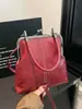 2026 Nueva Bolsa Vintage de Cuero Suave para Mujer, Bolso de Hombro Cruzado de Moda para Dama, Bolso de Pinza de Mano para Comercio Transfronterizo