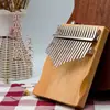 Fiddle de pulgar de 17 tonos para principiantes, núcleo de flor de durazno, fiddle de dedo, introducción, fiddle de trémolo, instrumento musical pequeño portátil, chapa, fiddle Karimba