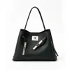 Nova bolsa de mão feminina em couro genuíno, bolsa de ombro e crossbody casual e versátil, bolsa Kelly de alta qualidade simples e luxuosa para exportação