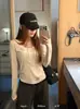 Trece FilasKAPOKOtoño/Invierno Nuevo Estilo Coreano Cuello en U Bolsillo Doble Manga Larga Capa Base Camiseta de Manga Larga 61125