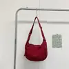 2025 Bolso de Hombro Nuevo Bolso Dumpling Estilo Deportivo para Mujer Japonés Simple Gran Capacidad Versátil Bolso Cruzado de Nylon