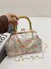 Nova Bolsa de Jantar Bordada Estilo Chinês Estilo Nacional 2025 Nova Bolsa Transversal com Corrente de Pérolas Bolsinha Retrô de Nicho Bolsa Dourada
