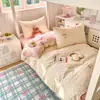 Ropa de cama de algodón 100% estilo Muji para estudiante universitario Juego de tres piezas Sábana individual Funda de edredón Juego de cuatro piezas para dormitorio Ropa de cama