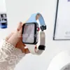 Adecuado para apple watch hebilla plegable correa de silicona iWatch apple cintura pequeña correa de reloj magnética de dos colores