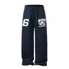 Pantalones de chándal anchos estampados casuales estilo coreano de hip-hop americano para mujer, otoño, corte holgado, pantalones de pierna curva para danza jazz