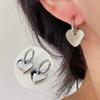 Pendientes de acero inoxidable europeos y americanos transfronterizos de Amazon, pendientes de amor retro, pendientes de oro de 18 quilates en forma de corazón, orejas de mujer de moda