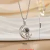 Venta Caliente Transfronteriza Creativo Astronauta Luna y Estrella Proyección 100 Idiomas Te Amo Pareja Día de San Valentín Collar Joyería