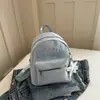 Mochila de moda con estampado de letras para estudiantes universitarios, Nueva mochila escolar de lona de gran capacidad para mujer, Otoño 2026
