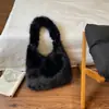 Bolso de felpa para el hombro para mujer de otoño e invierno, un bolso de hombro elegante y versátil, un bolso de mano moderno y versátil, un bolso mullido, un bolso con forma de dumpling