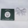 Caja de embalaje caja de aretes caja de collar caja de pulsera caja de anillos bolsa de mano paño para limpiar plata agua para limpiar plata una generación de 001