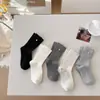 Calcetines de Mujer Estilo Coreano con Botones de Flores Pequeñas, Calcetines de Micro Presión Nuevos Otoño e Invierno, Calcetines sin Costuras de Media Pantorrilla, Color Sólido, Calcetines Slouch Simples Versátiles