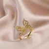 El Anillo Más Vendido de Amazon de Lujo Ligero y Suave con Incrustaciones de Cobre y Circonita Super Brillante de Lazo Abierto Anillo de Celebridad de Internet de Gama Alta
