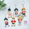 Llavero de One Piece Colgante de Goma Blanda Animación de Dibujos Animados Luffy Llavero de Coche Adornos Colgantes Caja Sorpresa Muñeca Pequeña Personalización