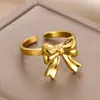 Europa y Estados Unidos nuevo anillo de lazo chapado en oro de 18 quilates acero inoxidable simple moda Joker anillo fabricantes venta al por mayor