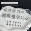 Conjunto de Decoração para Unhas Cruzadas com 12 Peças, Popular Estilo Punk Transfronteiriço Rebites Metálicos Pedras de Strass para Unhas Acessórios DIY
