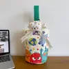 Venta al por mayor del fabricante Bolso de mano artístico de moda Bolso de lona Bolso tipo cubo de gran capacidad para mujer 2026 Nuevo Bolso para almuerzo de trabajo