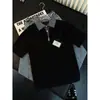 Camiseta de polo de manga corta para hombre de estilo americano, con media cremallera, retazos a cuadros, para adolescentes, con un look fresco y sofisticado.
