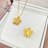Colgante de mariposa de seda hueca dorada de nuevo estilo antiguo con transmisión en vivo, collar de mariposa de diamantes de alta calidad a la moda para mujer, venta al por mayor