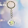 Nuevo Colgante Creativo de Bolsa con Cara Sonriente de Pulpo Brillante Dibujo Animado Pequeño Regalo Llavero de Moda Anillo de Llave