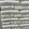 Grânulos de Polietileno Linear Lldpe Zhejiang Petrochemical Dfdc-7050 para Moldagem por Sopro, Grau Transparente, Antiestático, Resistente a Altas Temperaturas