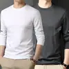 Camiseta casual versátil de manga comprida para outono para homens, gola redonda, cor sólida da moda, confortável, respirável e com caimento solto