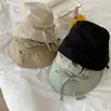 Sombrero de pescador con cordones para niños de Corea del Sur, Xia Dong Gate, compra en el blogger, el mismo sombrero ligero, resistente al viento y con cuerda para el sol.