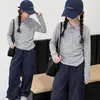 Conjunto de Camisa Polo de Manga Larga de Otoño para Niñas 2026 Nueva Moda Elegante Ajustado con Pantalones Cargo para Niños Mayores
