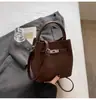 Bolso retro de moda para mujer, nuevo modelo primavera 2026, bolso de hombro y cruzado casual versátil de alta gama